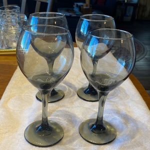 Vintage glassware. Set of 4. Like new. Smoke glass with amethyst reflections.